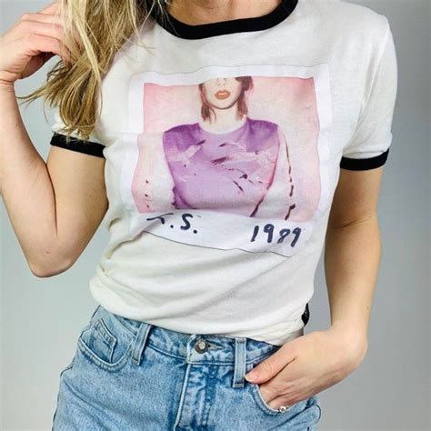1989 tour merch - Pierre Milkins and Millie Porter together spent $2100 on Swift merch at Crown’s ... at the pop-up in matching 1989 cardigans ... that they could each pick up a black Eras Tour jumper and ...